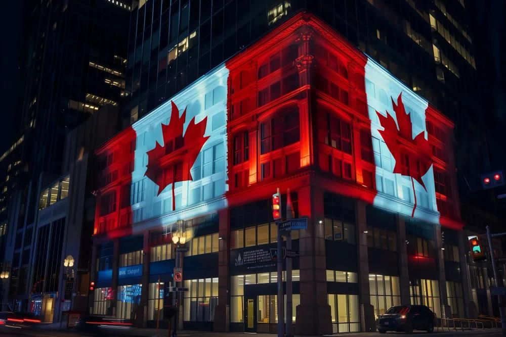 Building in Canada illuminated with national flag representing Immigration, Refugees and Citizenship Canada