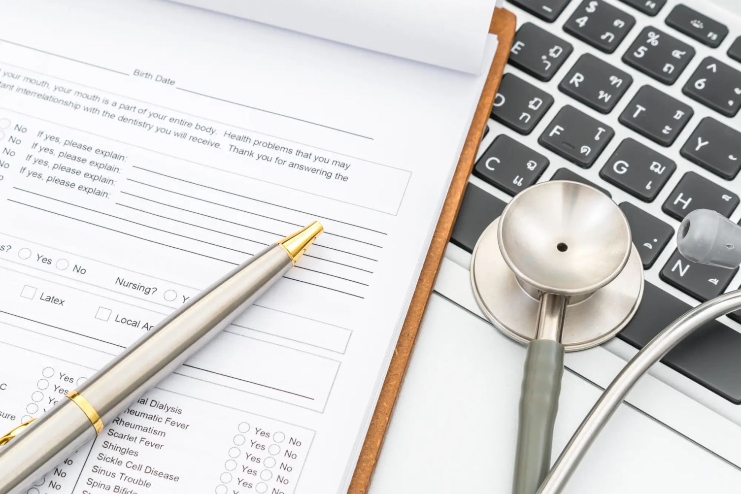 "A medical form and stethoscope, symbolizing the medical examination process for immigration