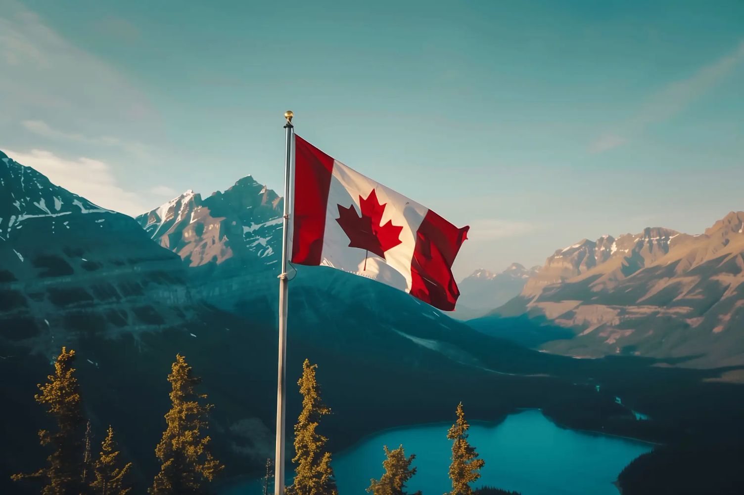 "Canadian flag waving in Banff National Park, with a scenic mountainous backdrop, symbolizing the country's immigration programs and opportunities for newcomers."